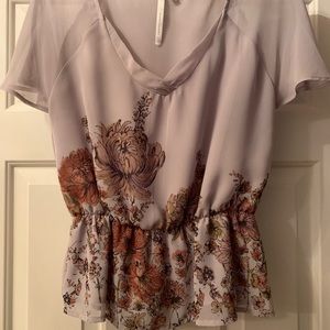 V-neck blouse with elastic gather at waist